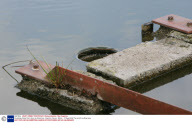 Ducklings fished from drain by fisherman, Colyford, Devon, Britain - 12 Aug 2009