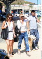 Ex 'Desperate Housewives' actress NICOLLETTE SHERIDAN shows off her flat belly while strolling with friends in Malibu