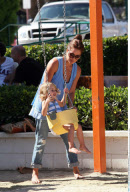 Actress BROOKE BURKE spending quality time with her kids at a park in Malibu