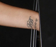 Victoria Beckham showing off new tattoo