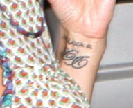 Victoria Beckham showing off new tattoo