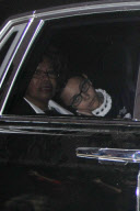 Paris Jackson leans on her grandmother's shoulder as they drive to her father's funeral