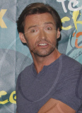 Hugh Jackman gets sweaty with a 'big' fan at the Teen Choice Awards