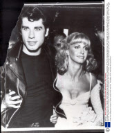 Olivia Newton John & John Travolta... British Singer Olivia Newton-john And John Travolta Stars Of The Film Saturday Night Fever Had To Struggle To Get Into Hollywood''s Chinese Theatre-to See Their Own Film. They Were At The Premiere Of Grease And H