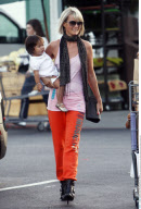 Actress LAETICIA BOUDOU took her two adopted daughters grocery shopping in Beverly Hills