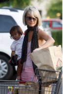 Actress LAETICIA BOUDOU took her two adopted daughters grocery shopping in Beverly Hills