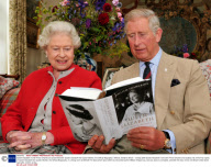 Queen Elizabeth II and Prince Charles are presented with 'Queen Elizabeth the Queen Mother, the Official Biography', Birkhall, Sotland, Britain - 12 Sep 2009