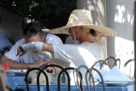 Nicollette Sheridan wears a giant sombrero hat