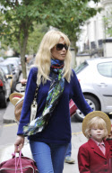 CLAUDIA SCHIFFER PICKS UP THE KIDS