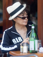 Yoko Ono having lunch with a friend at Bar Pitti