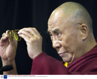 The Dalai Lama at a press conference at the Bell Center in Montreal, Canada - 03 Oct 2009