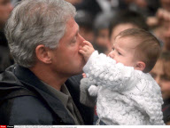 TURKEY/IZMIT:PRESIDENT CLINTON VISITS EARTHQUAKE VICTIMS.BILL CLINTON HOLDING A BABY