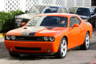*EXCLUSIVE* Arnold Schwarzenegger shows off his classic Dodge Challenger SRT