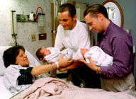 Proud Fathers Barrie Drewitt And Tony Barlow With Their Children Saffron And Aspen Drewitt-barlow After Their Surrogate Mother Rosalind Bellamy Delivered Them... Barrie Drewitt And Tony Barlow Who Have Won American Court Support As Gay Fathers Of A Tw