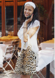 Which cute French model carries a leopard print Yves Saint Laurent Tribute tote?
