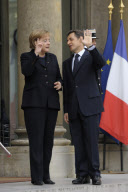 Armistice Celebration / Nicolas Sarkozy receives Angela Merkel