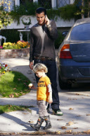 Singer GWEN STEFANI with chambermaid-boots and rocker family seen visiting a friends house