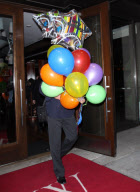 Ryan Seacrest attending Larry King celebrates his 76th birthday celebration