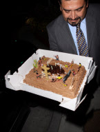 Ryan Seacrest attending Larry King celebrates his 76th birthday celebration