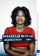 POLICE MUGSHOTS OF HUGH GRANT AND DIVINE BROWN AFTER THEIR ARREST FOR LEWD CONDUCT - 1995