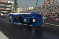 Photographer Andy Willsheer almost hit by a drag race car, Pomana Raceway, California, America - 14 Nov 2009