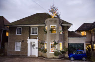 40ft Christmas tree fitted into a family home, Bournemouth, Britain - 13 Dec 2009