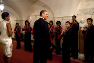President Barack Obama and First Lady Michelle Obama greet members of the Strings For Joy ensemble during a holiday party at the White House, Washington DC, America - 14 Dec 2009