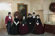 The Dickens Carolers greet guests in the Book Cellars Hall of the White House during a holiday party, Washington DC, America - 20 Dec 2009