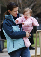 Actress JENNIFER GARNER carries pink teddy bear lookalike SERAPHINA to a local playground