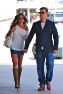 Robbie Williams and Ayda Field do PDA at LAX