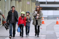 Actress KATE BECKINSALE with daughter, puppy and hubby out for a stroll on Santa Monica beach