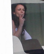 EXCLUSIVE Britney Spears shows off new brunette do while smoking with mom
