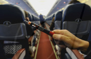 Syringe and 500ml Bottle of Clear Fluid Carried on to a Plane 5 Days After Terror Attempt on a Delta Airlines Flight, Schipol Airport, Amsterdam, Netherlands - 30 Dec 2009
