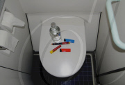 Syringe and 500ml Bottle of Clear Fluid Carried on to a Plane 5 Days After Terror Attempt on a Delta Airlines Flight, Schipol Airport, Amsterdam, Netherlands - 30 Dec 2009