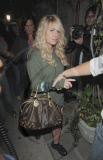 Singer JESSICA SIMPSON with fresh blow dried hair and splintered nail polish leaving the Ken Paves salon