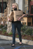 Reese Witherspoon caffeinates to get ready for a busy day