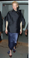 Top model KATE MOSS looking sexy in a tuxedo jacket with beau HINCE