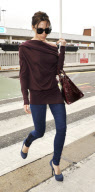VICTORIA BECKHAM ARRIVES AT HEATHROW