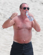 Michael Kors outie on the beach in Saint Barth