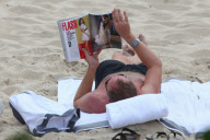 Michael Kors outie on the beach in Saint Barth