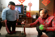 Obese two-year-old weighs as much as adult woman, Taocun town, Shanxi province, China - 02 Mar 2010