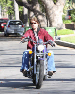 Billy Ray Cyrus Rides A Purple Hog With No Helmet