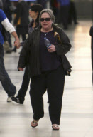 Kathy Bates Walks With A Cane Through LAX 