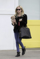 ASHLEY TISDALE and her maltese poodle BLONDIE leaving the Byron & Tracey salon