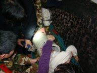 Police, firefighters and repairman free child trapped in washing machine, Xi'an, Shaanxi province, China - 11 Mar 2010