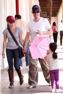 Reese Witherspoon and Jim Toth hand in hand