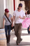 Reese Witherspoon and Jim Toth hand in hand