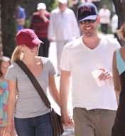 Reese Witherspoon and Jim Toth hand in hand _Part2