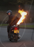 Flame-throwing scooter, Stamford, Lincolnshire, Britain - 23 Mar 2010