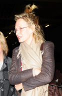 UMA THURMAN ARRIVES AT LONDON HEATHROW